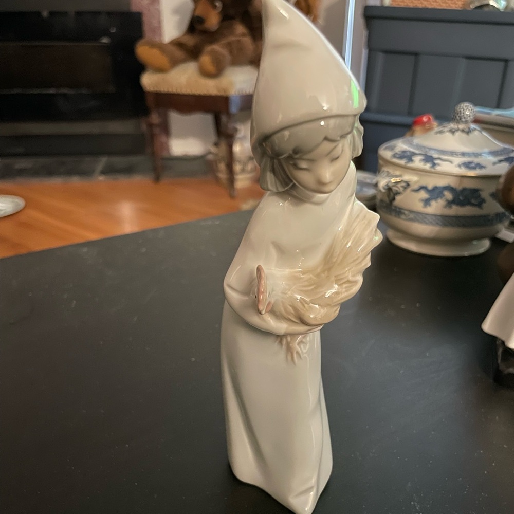 Lladro figurine of a Girl with a Rooster